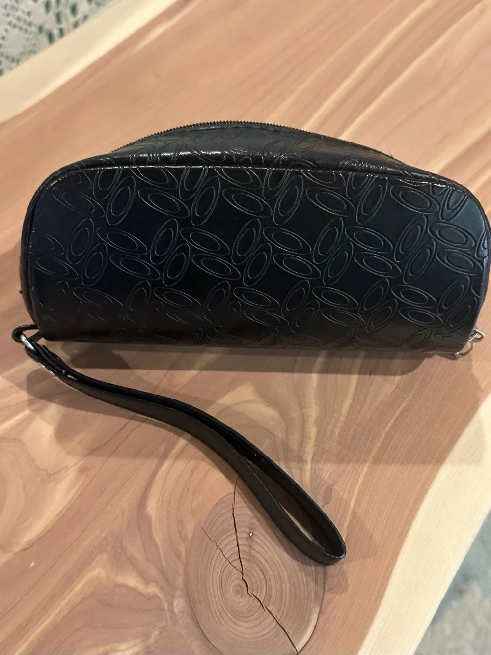 NWT Oakley Black Embossed Soft Sunglasses Case with wrist strap.